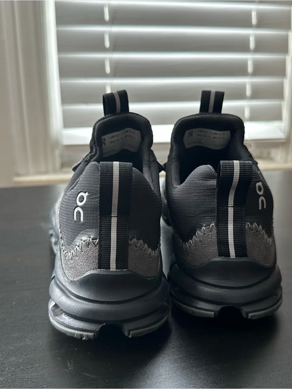 On Cloud Running women’s Black and Gray Trail Sneakers